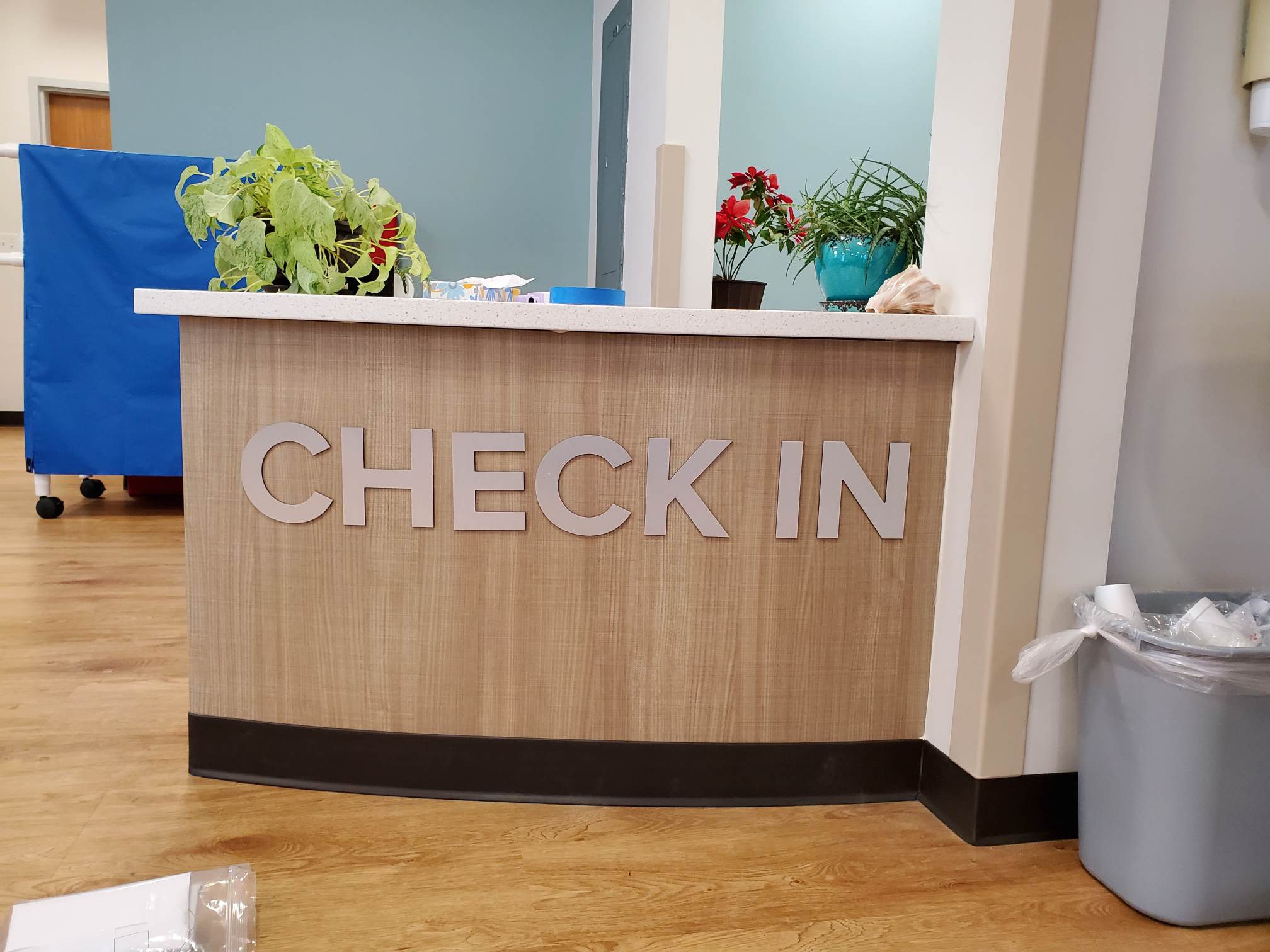 Check-in desk with plants