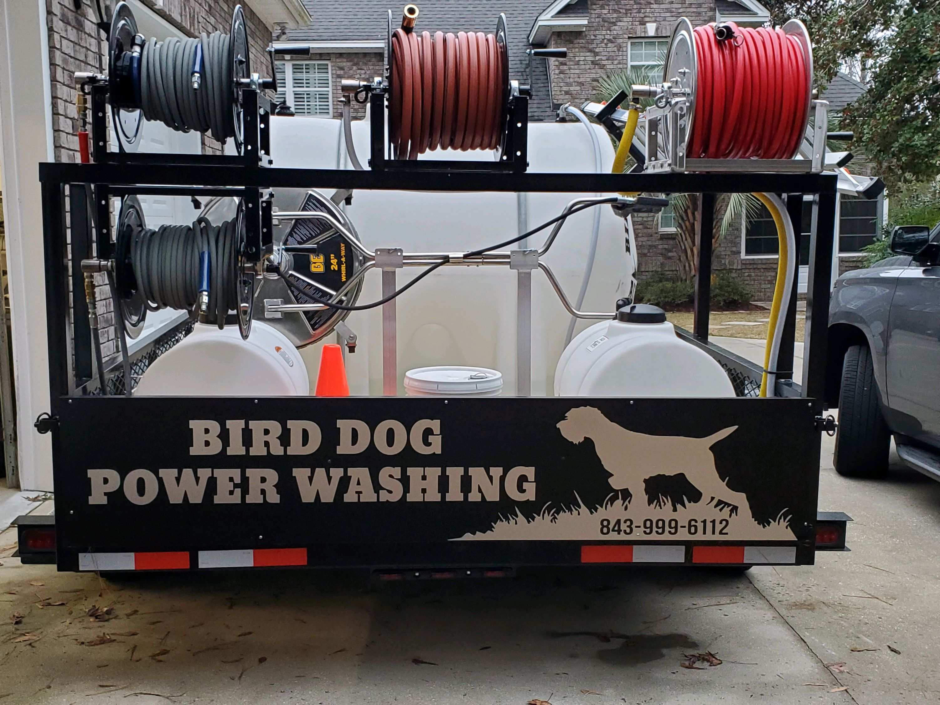 Pressure washer hoses and reels